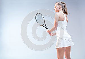 Young woman playing tennis