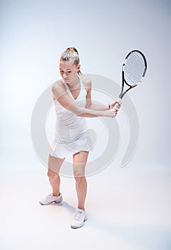 Young woman playing tennis