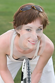 Young woman playing tennis, closeup