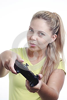 Young woman playing video game with joystick