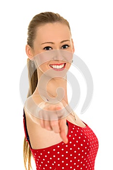 Young woman pointing