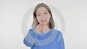 Young Woman Pointing at the Camera on White Background