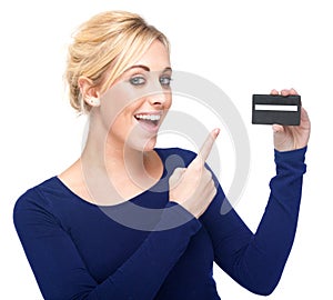 Young Woman Pointing at a Credit Card