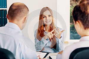 Young woman pointing her advantages during the recruitment interview