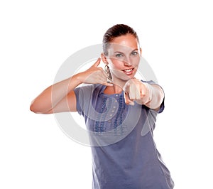 Young woman pointing-looking at you saying call me