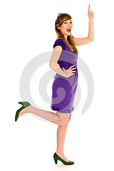 Young woman pointing up