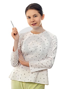Young woman pointing up with pen
