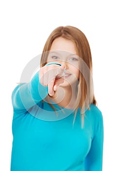 Young woman pointing on you