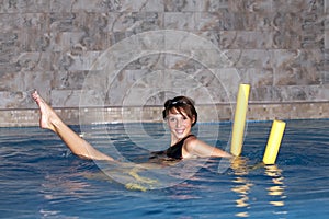 Young woman in the pool