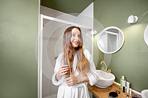 Young woman portrait in the bathroom