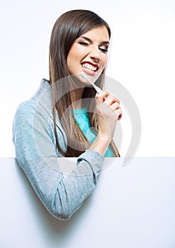 Young woman portrait hold toothy brush.