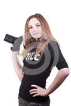 Young woman posing with professional photo camera