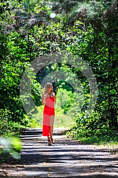 Young Woman Posing on The Tropical Road