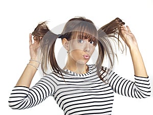 Young woman posing wearing a striped shirt