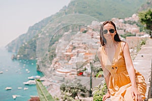 Young woman in Positano beach on Amalfi Coast, Italy