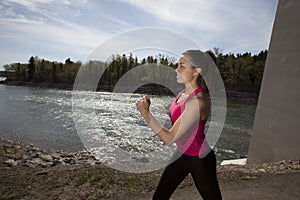 Young Woman Power Walking