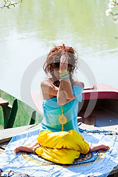 Young woman practice yoga outdoor by the lake healthy lifestyle concept  full body shot summer day