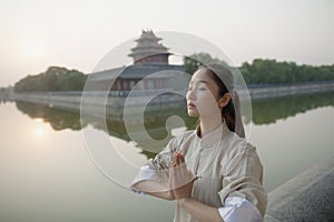 Young Woman Practicing Tai Ji