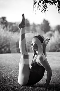 Young woman is practicing yoga