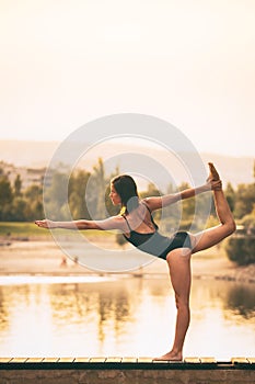 Young woman is practicing yoga