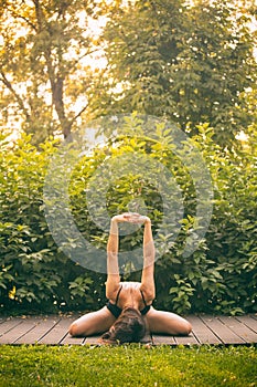 Young woman is practicing yoga