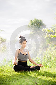 Young woman practicing yoga Everyday Yoga helps in concentration