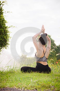 Young woman practicing yoga Everyday Yoga helps in concentration