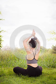 Young woman practicing yoga Everyday Yoga helps in concentration