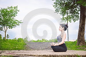 Young woman practicing yoga Everyday Yoga helps in concentration