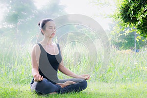 Young woman practicing yoga Everyday Yoga helps in concentration
