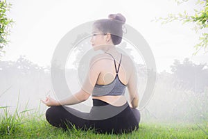 Young woman practicing yoga Everyday Yoga helps in concentration