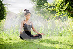 Young woman practicing yoga Everyday Yoga helps in concentration