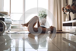 Young woman practicing yoga indoors