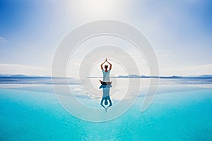 Young woman practicing yoga outdoors