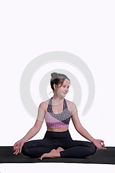 young woman practicing yoga To strengthen the shape of meditation strength in the whtie background