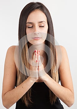 Young woman praying