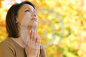 Young woman praying