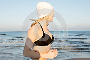 Young woman preapering for ice swimming