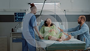 Young woman with pregnancy going into labor