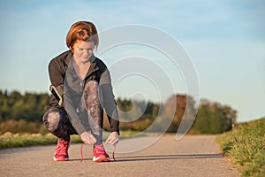 Young woman preparing for jogging