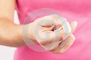 Young woman preparing for menstruation