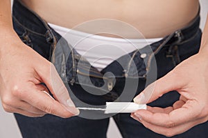 Young woman preparing for menstruation photo