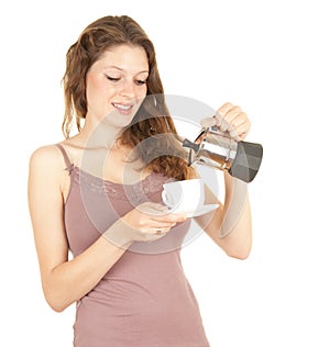 Young woman preparing morning coffee