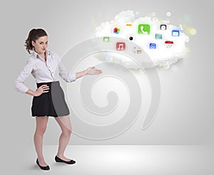 Young woman presenting cloud with colorful app