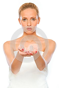 Young woman presenting something on empty hands