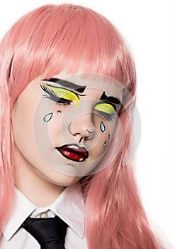 Young woman with professional comic pop art make-up. Funny cartoon or comic strip make-up