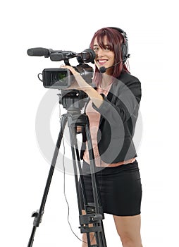 Young woman with a professional video camera