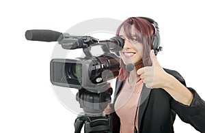Young woman with a professional video camera