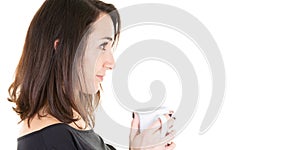 Young woman profile holding mug cup coffee drink looking blank copy space