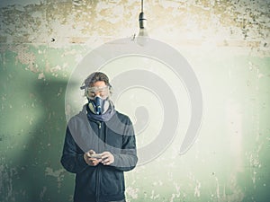 Young woman in protective gear using smart phone